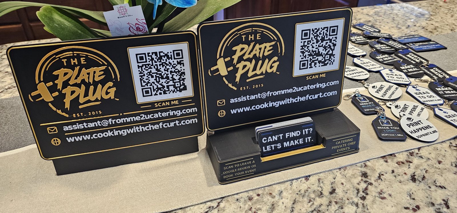 Printed black and gold name plates with QR codes